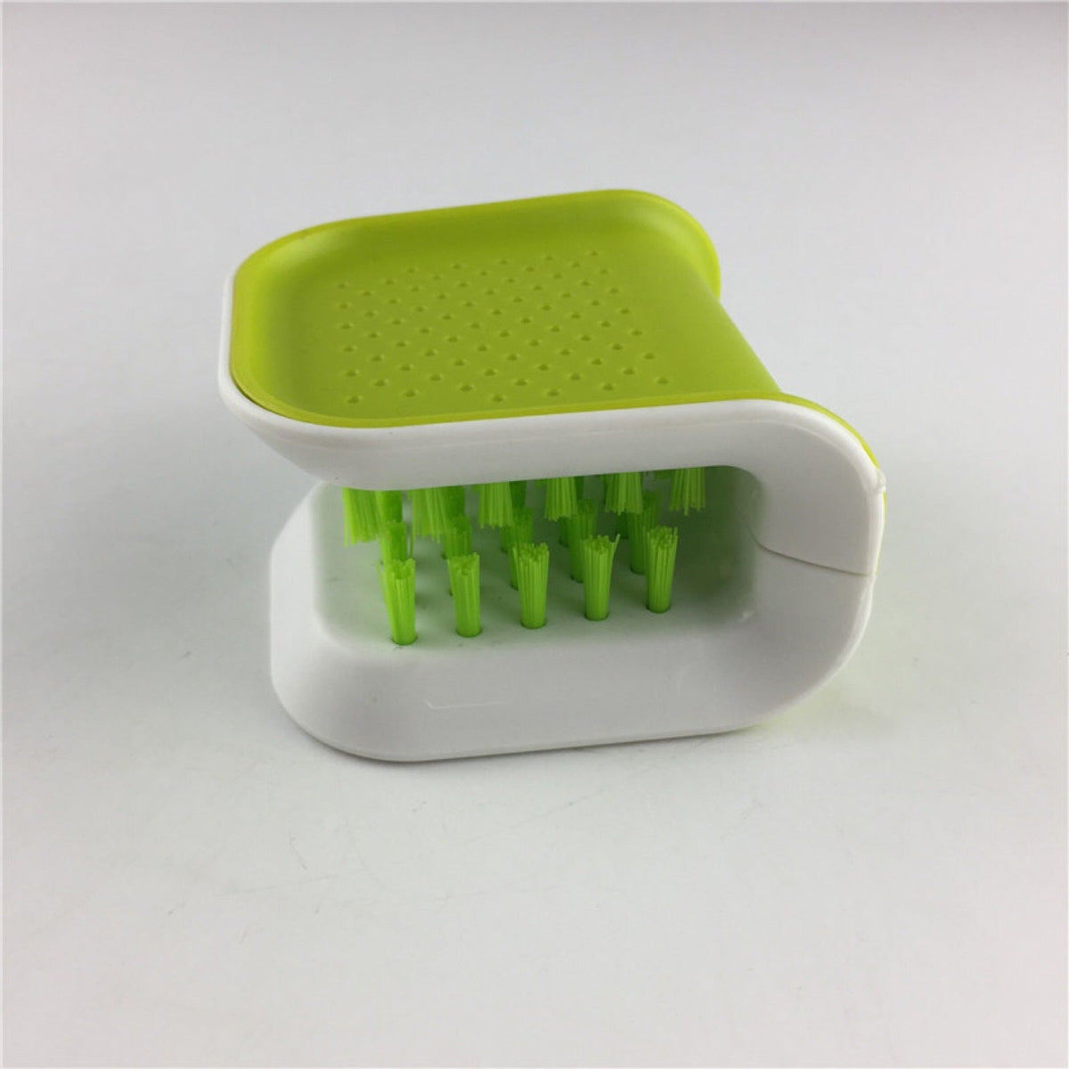 Knife and utensil brush with bristles on both sides