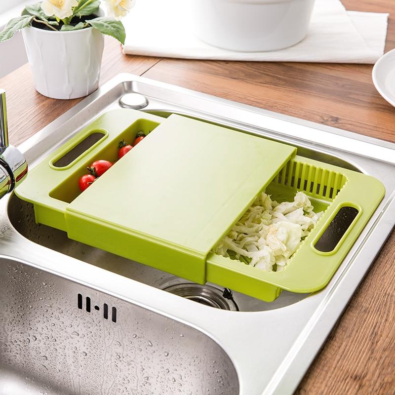 3-in-1 over-sink cutting board with built-in drain basket – view 1