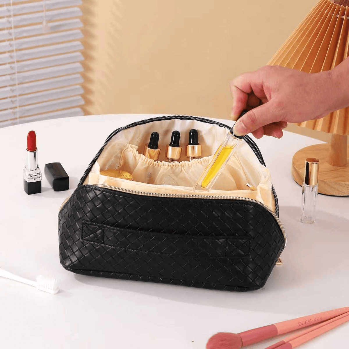 Travel makeup organizer with zippered compartments