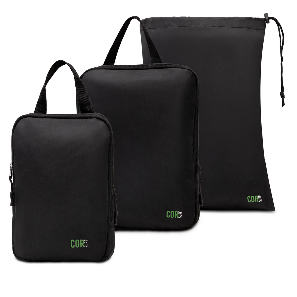 Compression packing cubes organizing clothing in travel luggage